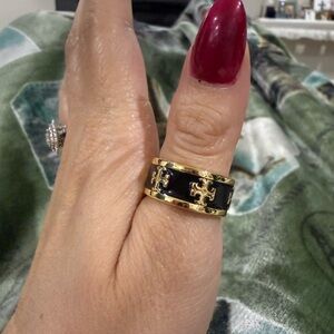 Gold and Black Woman’s Tory Burch Ring